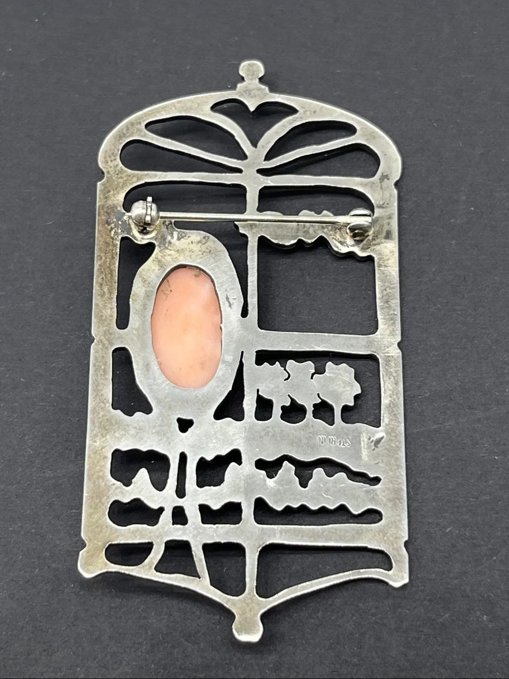Vintage art nouveau sterling silver brooch with floral carving